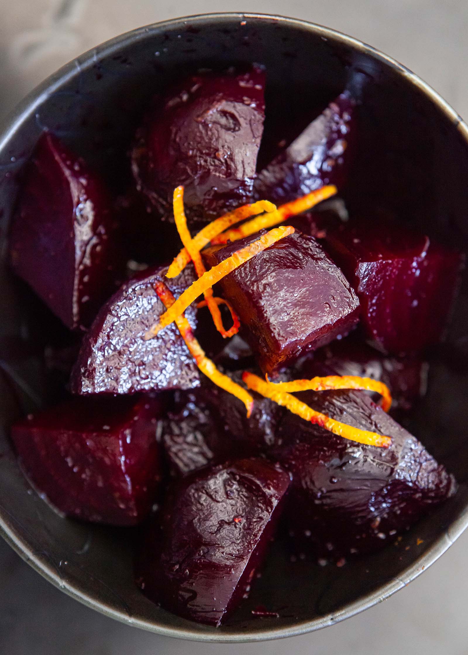 roasted beets with orange in a serving bowl
