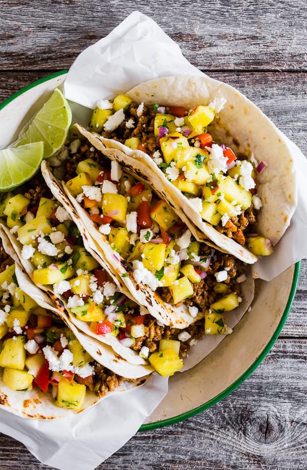 These ground pork tacos with pineapple salsa are the perfect mix of spicy and sweet. They