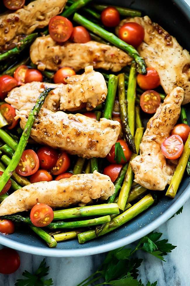 Balsamic chicken and veggies is a delicious meal all made in one pan with balsamic vinegar and honey creating a flavorful glaze. Life-in-the-Lofthouse.com